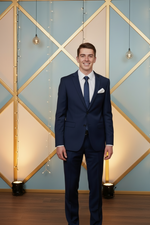 Charger l'image dans la galerie, Our Model is wearing Our Royal Blue 2 Piece Slim Fit Single Breast Suit with Notch Lapels, 2 Button Closure, side vents and flap slant pockets. 
