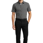 Charger l'image dans la galerie, Man wearing a black geometric patterned semi-fitted short sleeve  shirt and black pants
