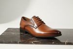 Charger l'image dans la galerie, Experience relaxed sophistication with these Classic Cap Toe Lace Up Oxford Dress Shoes. Made from premium vegan leather, they feature a stitched cap toe and blind eyelet lacing. The full-length leather sock liner ensures comfort, while the EVA cushioned footbed provides support with every step. With a durable, odor-free rubber outsole and a 1" heel, these shoes come in sizes 6 to 18 with medium and wide widths. Perfect for any occasion, they effortlessly elevate your outfit.
