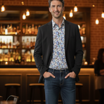 Load image into Gallery viewer, Our model is  wearing a white floral  patterned Cotton Spandex Long Sleeve Slim Fit  shirt and with dark  blue jeans. 
