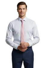 Load image into Gallery viewer, Model is wearing a white shirt with blue and pink geometric patterned shirt, pink tie, and dark blue pants 
