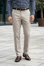 Load image into Gallery viewer, Our model is wearing a Stone Non-Iron Cotton Chinos with a navy print shirt
