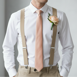 Load image into Gallery viewer, Man wearing a diamond white shirt with Khaki 1.5" Width suspenders,  peach tie, and boutonniere 
