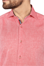 Load image into Gallery viewer, A man wearing a red cotton linen short sleeve shirt with contrasting pattern inside collar and sleeves 
