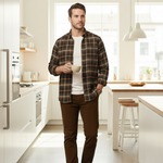 Load image into Gallery viewer, Man standing in a kitchen holding a mug dressed for a day out in a dark brown plaid shirt, white t- shirt and brown corduroys 
