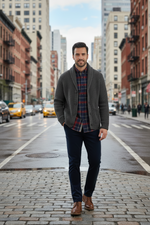 Charger l'image dans la galerie, Man wearing a gray knit cardigan  over a red and navy plaid slim fit cotton flannel button down collar shirt with navy corduroy pants 
 
