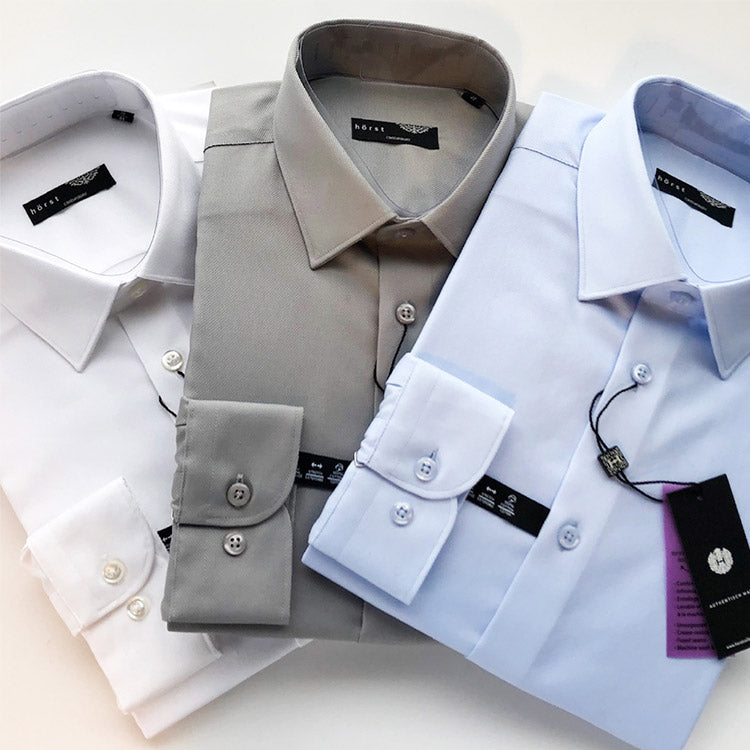 3 long sleeve slim fit dress shirts in 3 different colors. Semi spread collars with 1/4 inch stitch 100% cotton dress shirts  