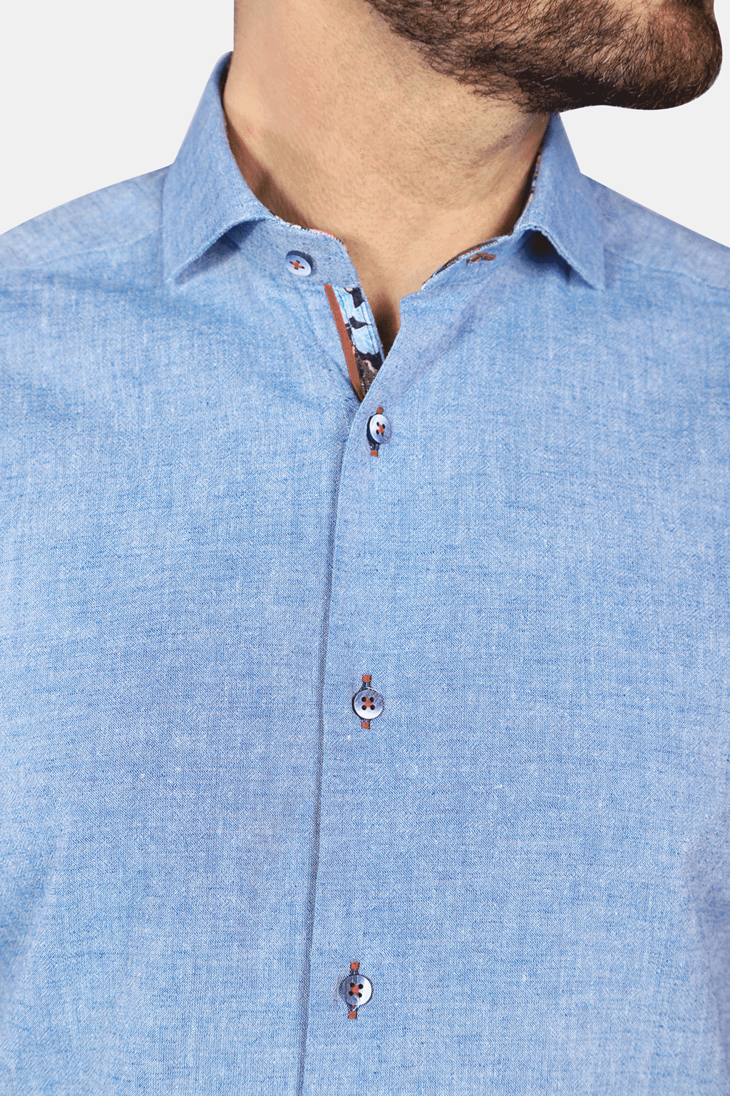 Blue linen buttoned short sleeve shirt.   
