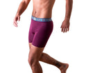 Charger l'image dans la galerie, Man wearing Turq Burgundy boxer briefs with blue and burgundy patterned waistband with Turq logo 
